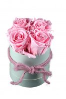 4 rosa haltbare Rosen in Hutschachtel