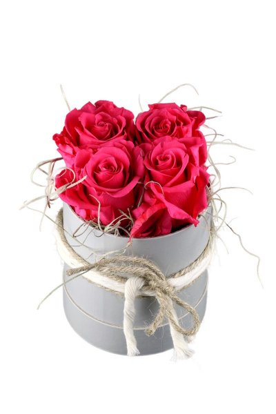 4 pink haltbare Rosen in Hutschachtel