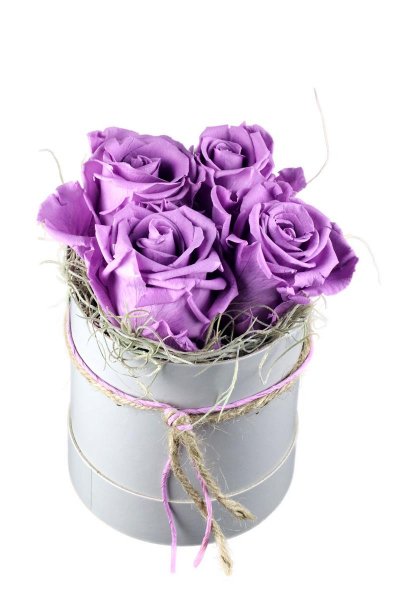4 fliederfarbene haltbare Rosen in Hutschachtel